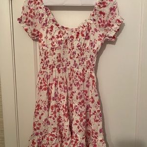 This pink and white dress from Isabelle’s Cabinet is a size S, great condition!